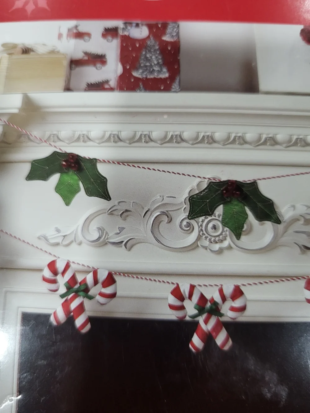 Holiday Time Red and White Candy Cane Garland with Green Bows